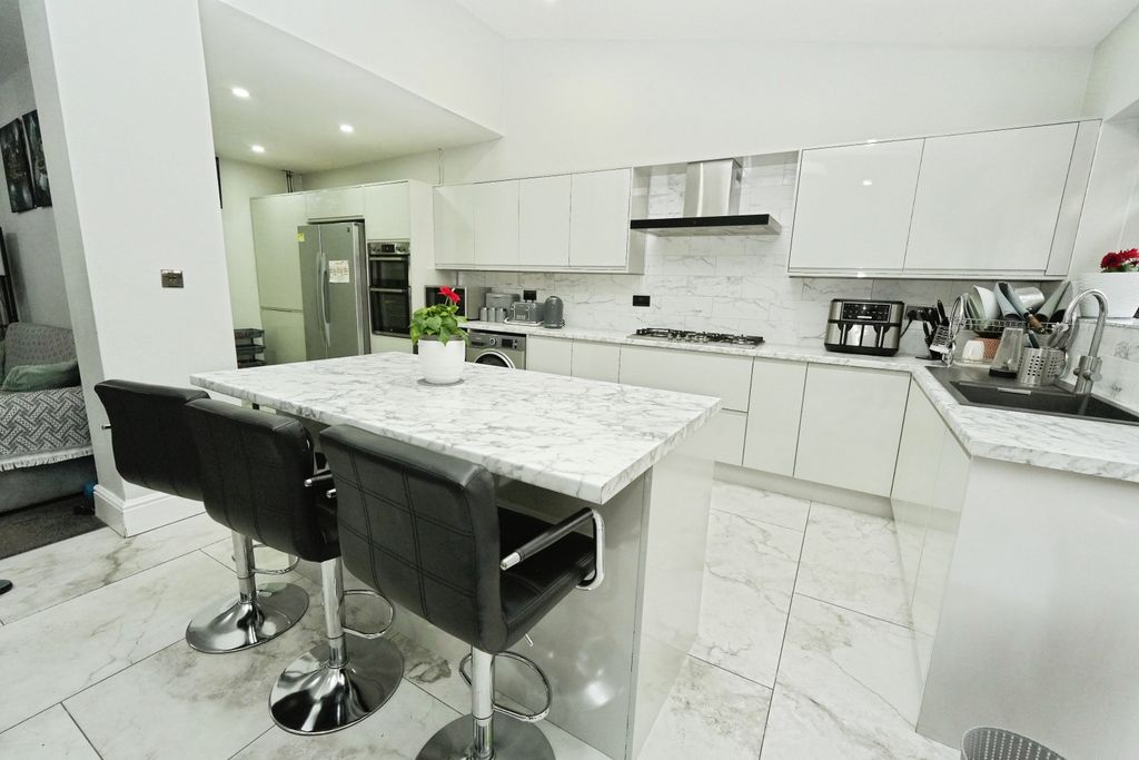 Property photo 2 of 25 Kitchen/Dining/Family Room