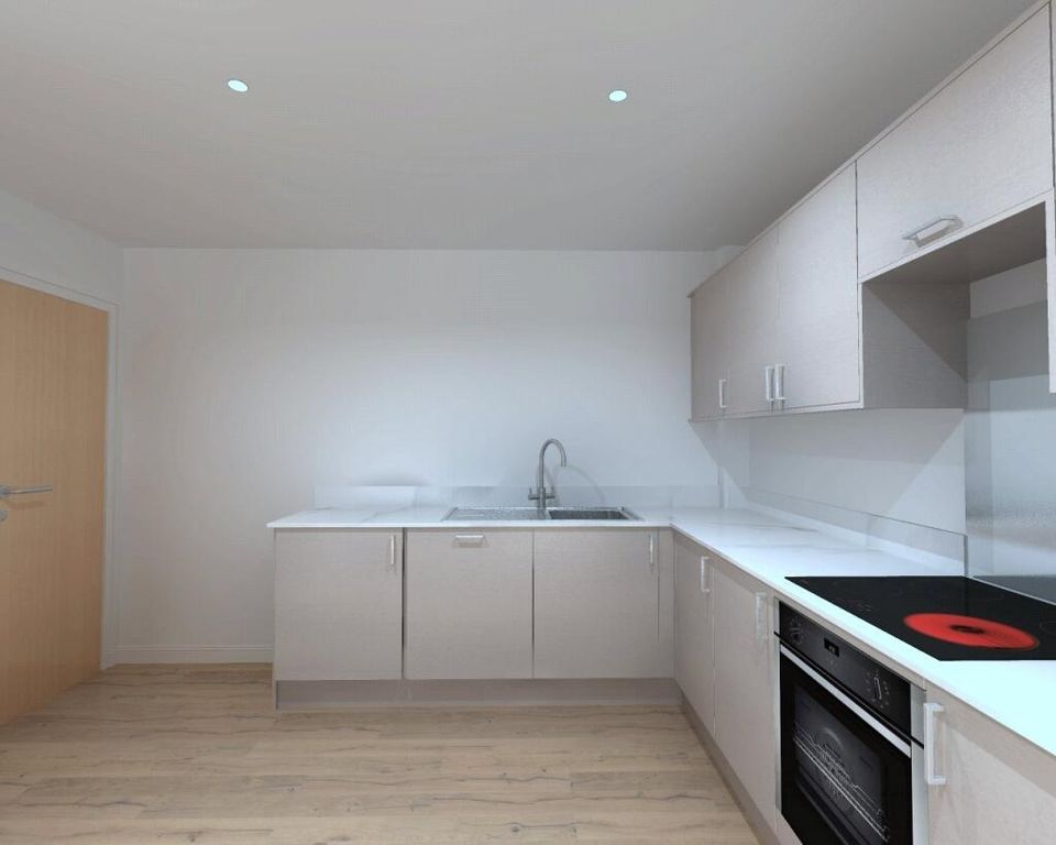 Property photo 1 of 3 Bright And Modern Kitchen Featuring Sleek White Ca...