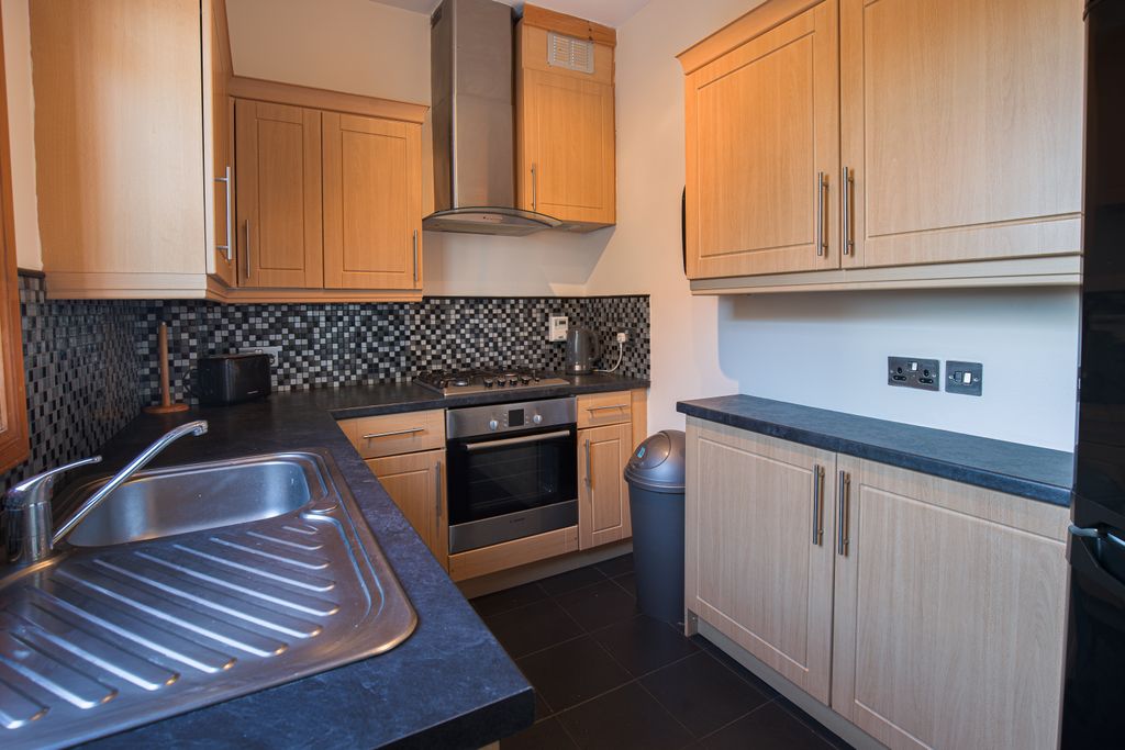 Property photo 1 of 6 Kitchen