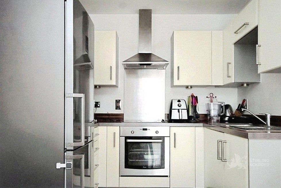 Property photo 2 of 8 Kitchen