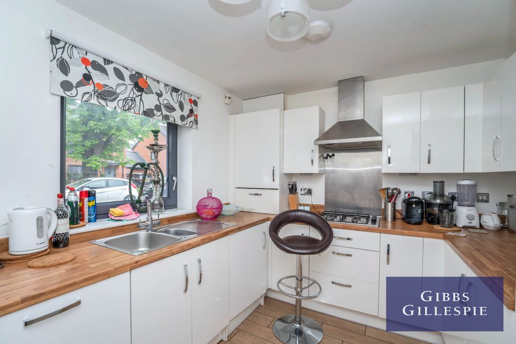 Property photo 3 of 12 7 Kitchen