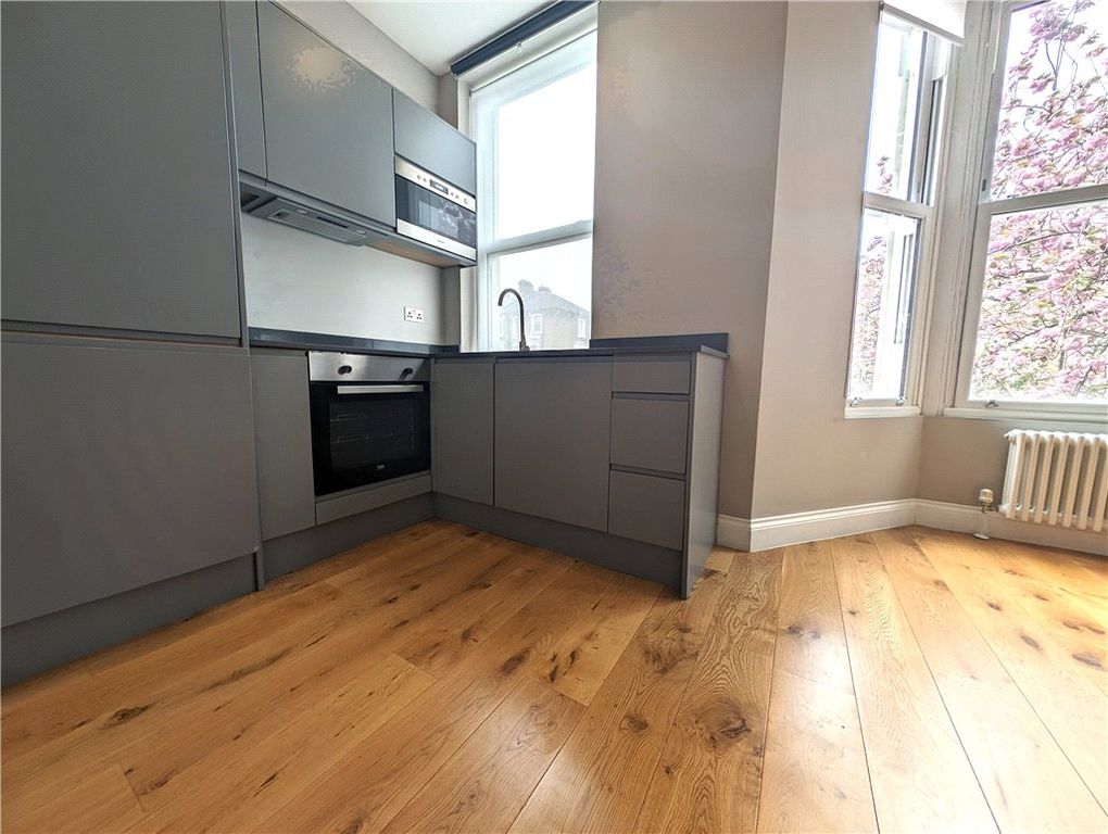 Property photo 3 of 7 Kitchen Area