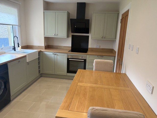 Property photo 2 of 12 Dining Kitchen