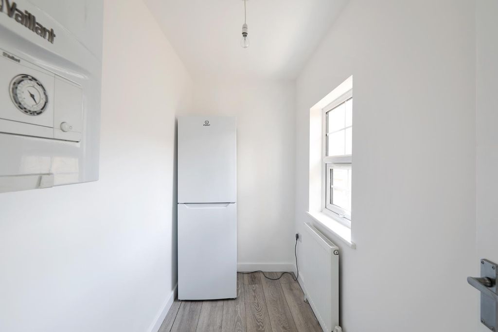 Property photo 3 of 12 Utility Room