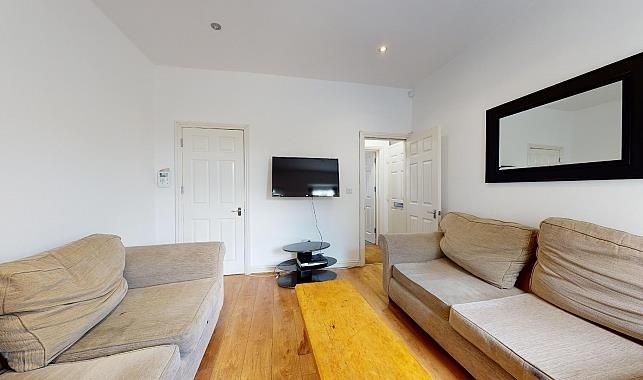 Property photo 3 of 10 Bright, Contemporary Living Room With Hardwood Flo...