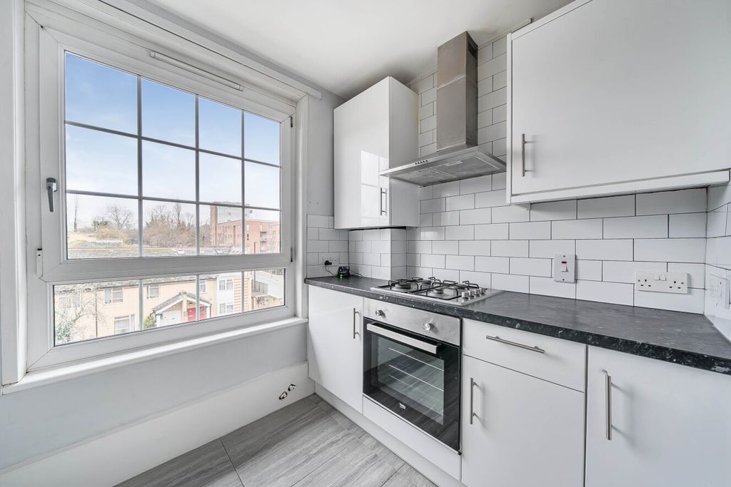 Property photo 3 of 15 1394489-14-694Ab3...