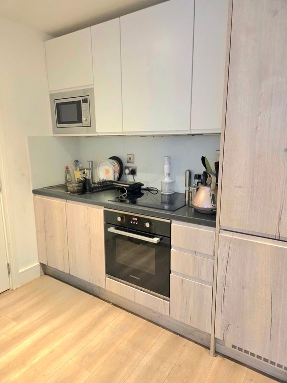 Property photo 3 of 8 Kitchen