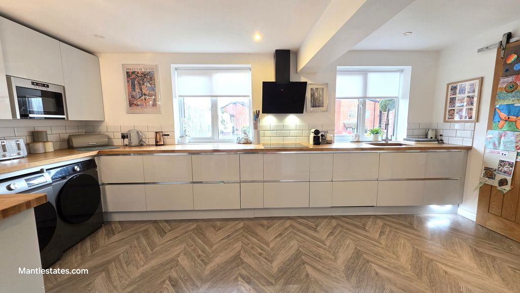 Property photo 2 of 26 Kitchen Area