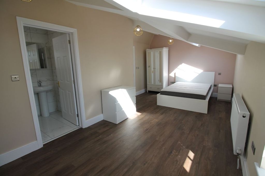 Property photo 3 of 15 Bright And Airy Master Bedroom Featuring Ample Nat...