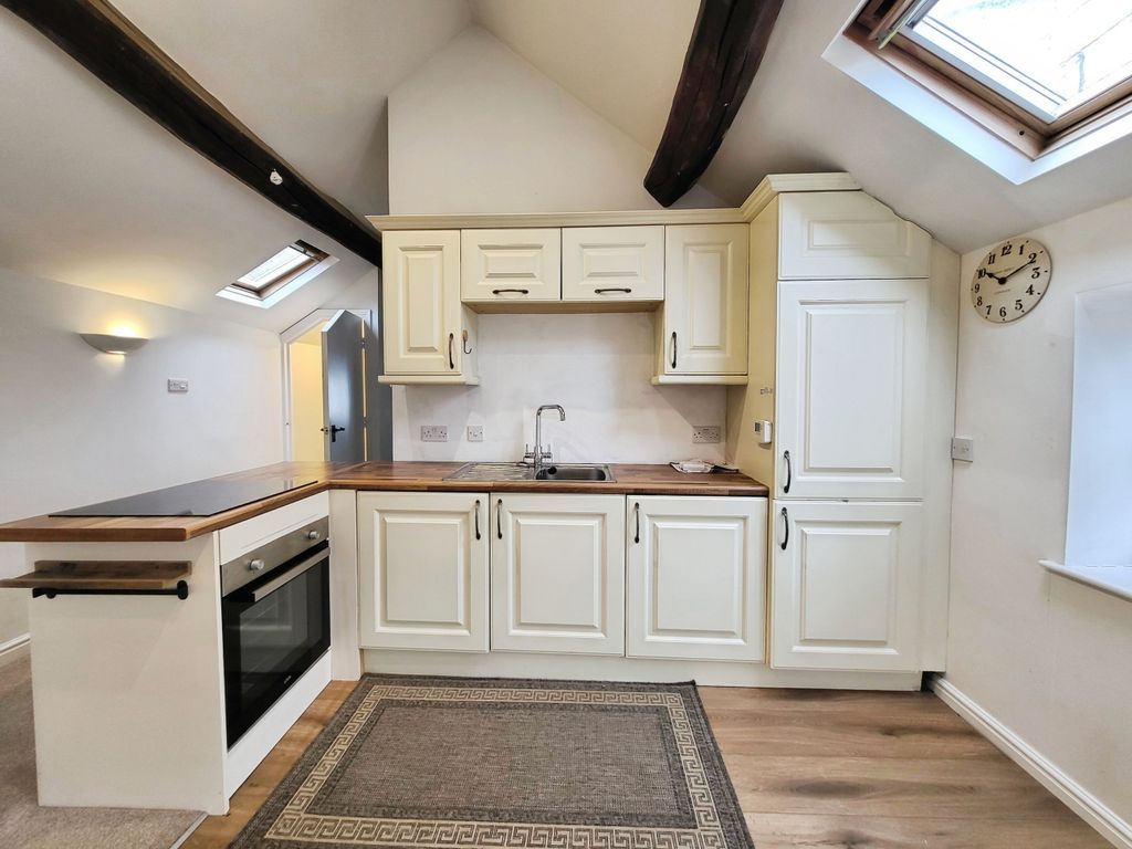 Property photo 3 of 7 Kitchen Area