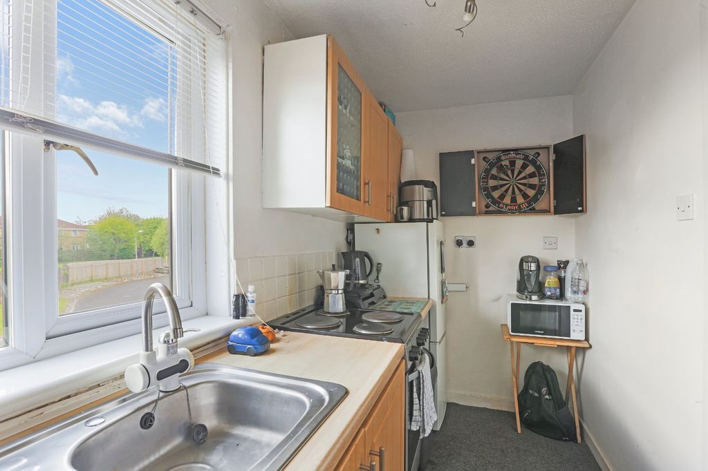 Property photo 3 of 7 Kitchen