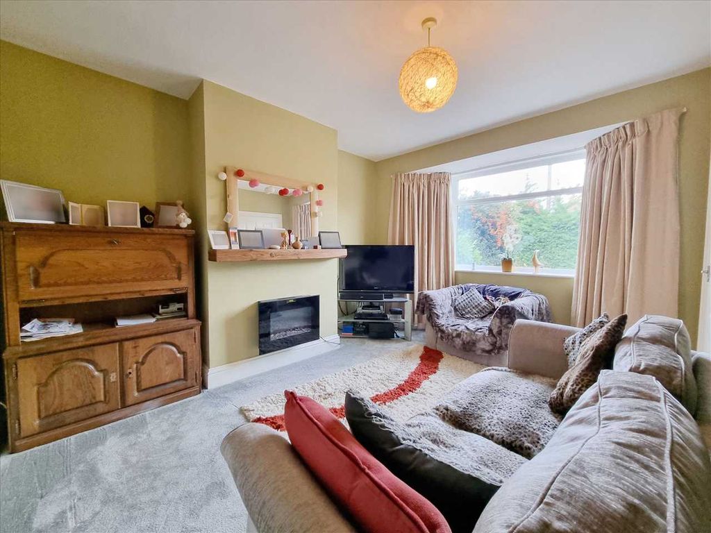 Property photo 2 of 13 Lounge: