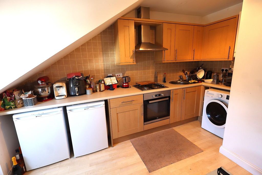 Property photo 2 of 10 Kitchen Area