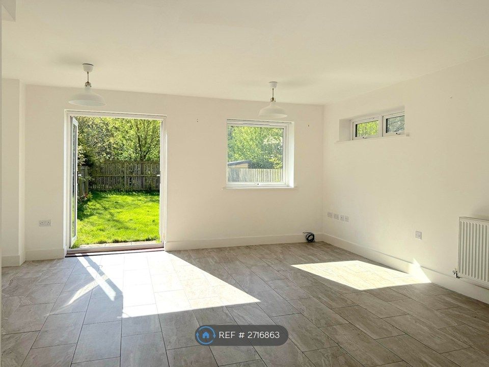Property photo 3 of 19 Downstairs Living Area