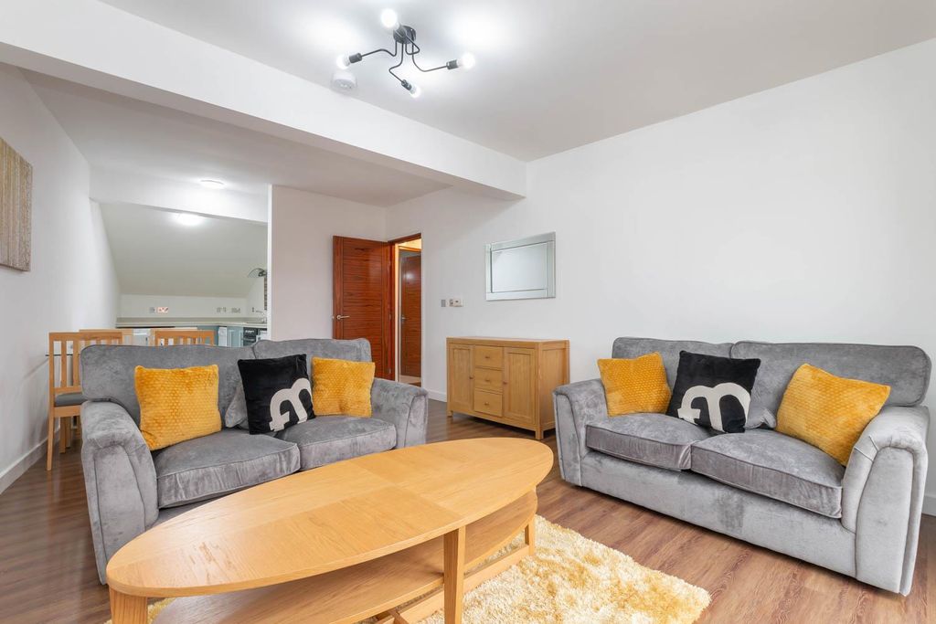 Property photo 1 of 10 Living Area