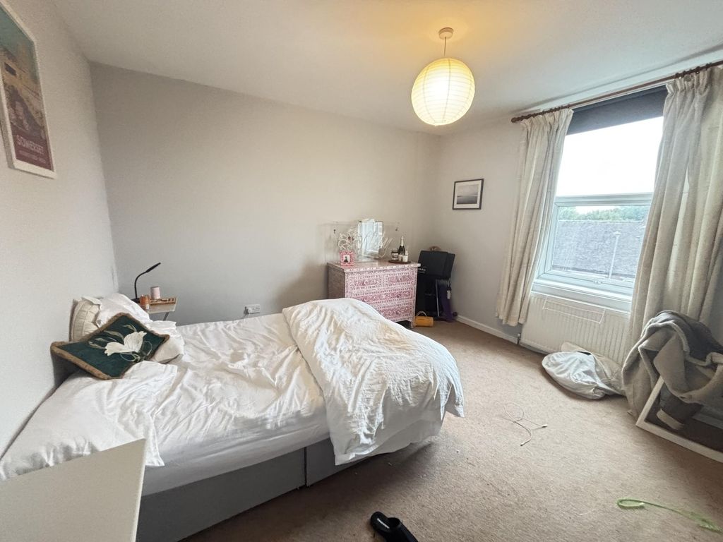 Property photo 3 of 39 A Spacious And Bright Master Bedroom Featuring A c...