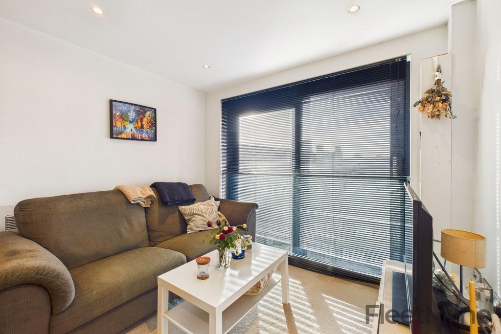 Property photo 2 of 13 Living Area