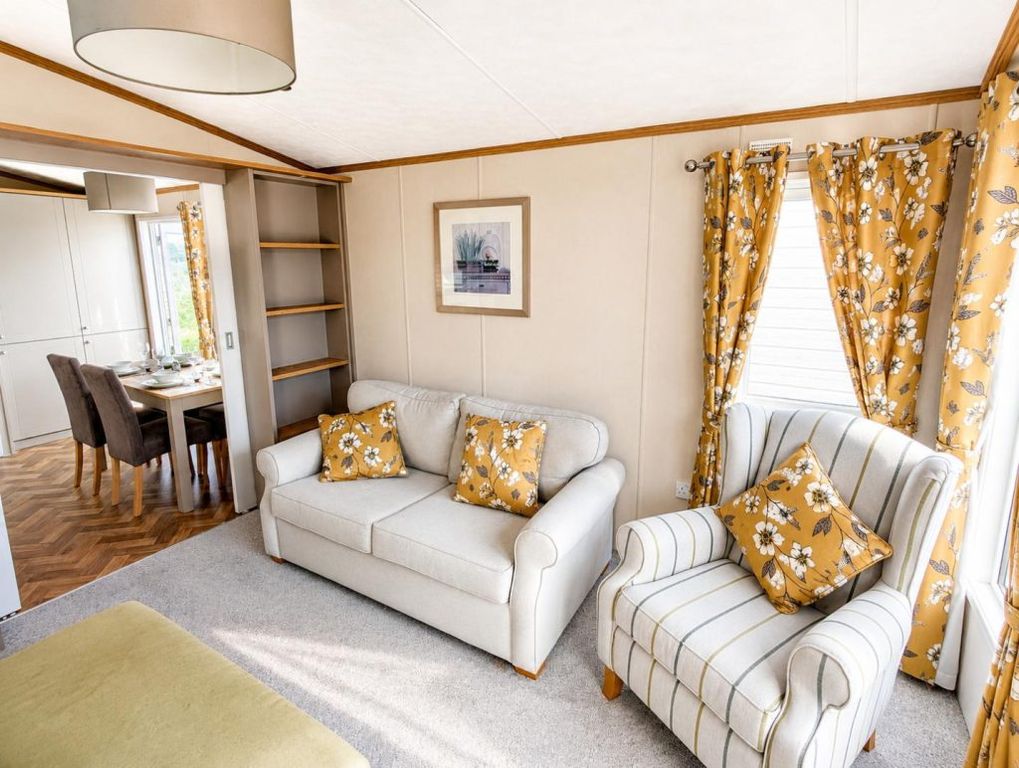 Property photo 1 of 6 Bright Pemberton Abingdon Lounge With Sofa, Armchair And Floral Furnishings