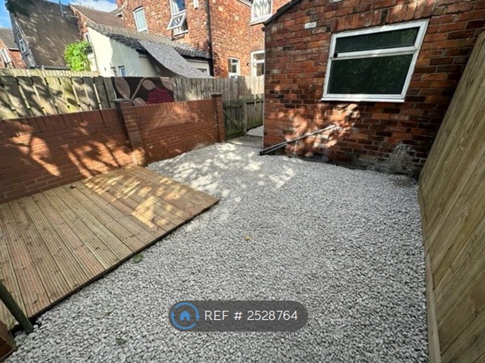Property photo 2 of 16 Rear Yard/Court Yard