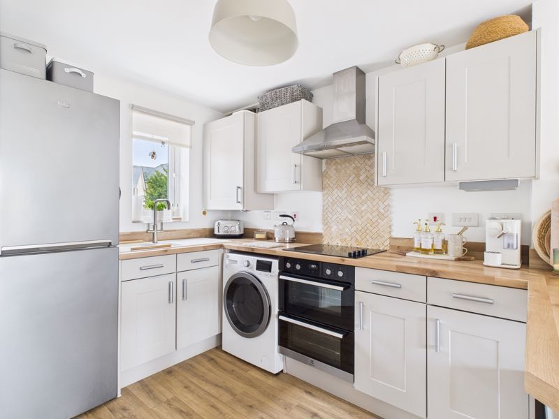 Property photo 3 of 12 Kitchen
