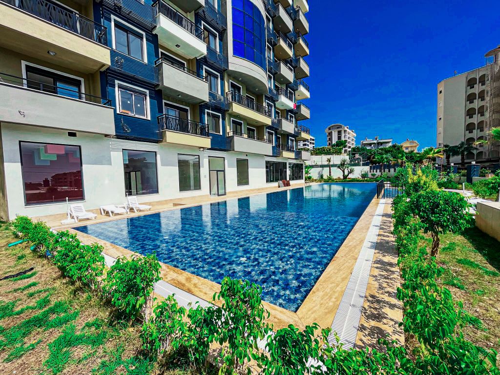 Property photo 1 of 22 Exceptional Two-Storey Furnished Apartment In Alanya For Sale In Avsallar - Communal Pool And Gardens