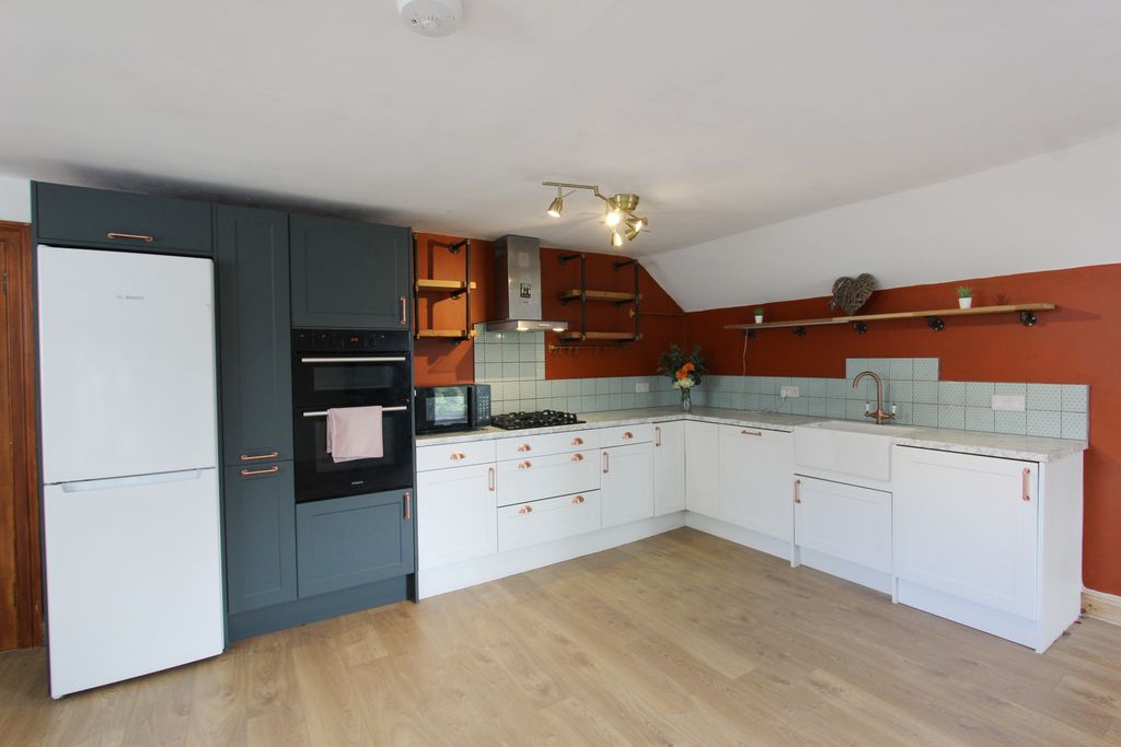 Property photo 2 of 15 Kitchen Area