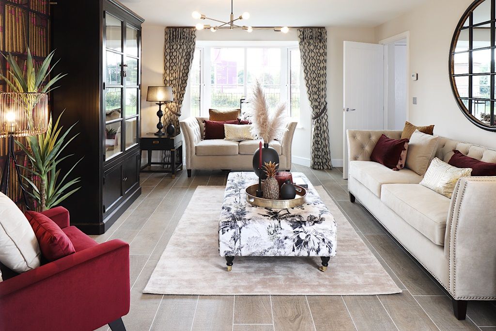 Property photo 1 of 11 A Lounge With Bay Window Floods The Room With Light