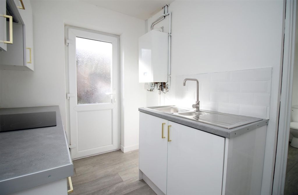 Property photo 2 of 28 Bright Modern Kitchenette With Sleek White Units...
