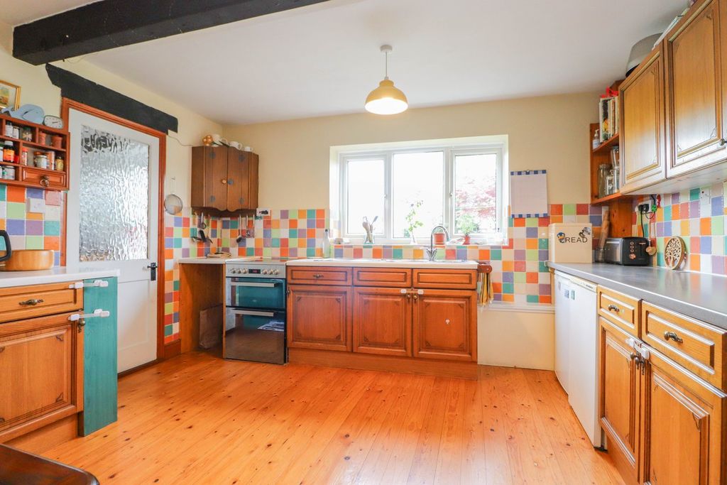 Property photo 3 of 32 Dining Kitchen