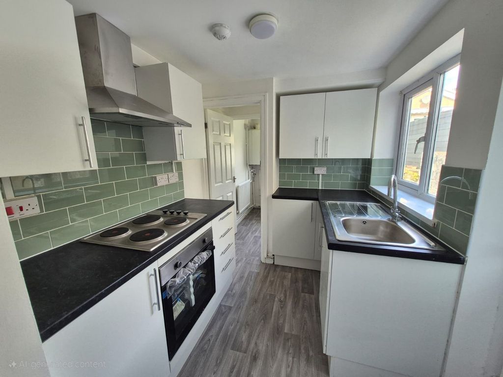 Property photo 2 of 12 Kitchen