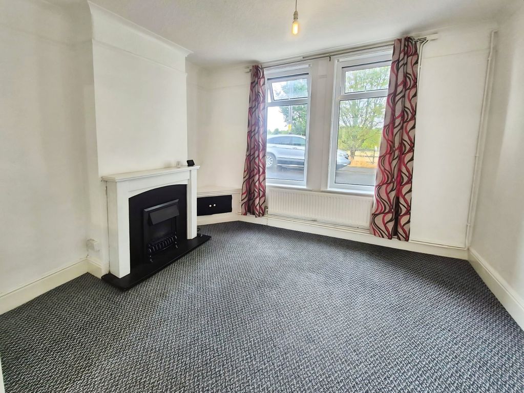 Property photo 2 of 12 Living Room 3