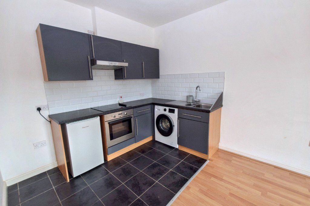 Property photo 3 of 12 Kitchen Area