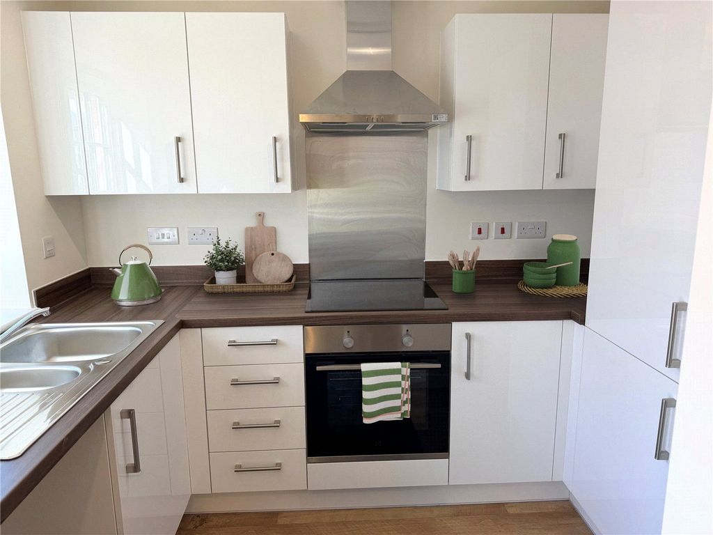 Property photo 2 of 8 Typical Kitchen