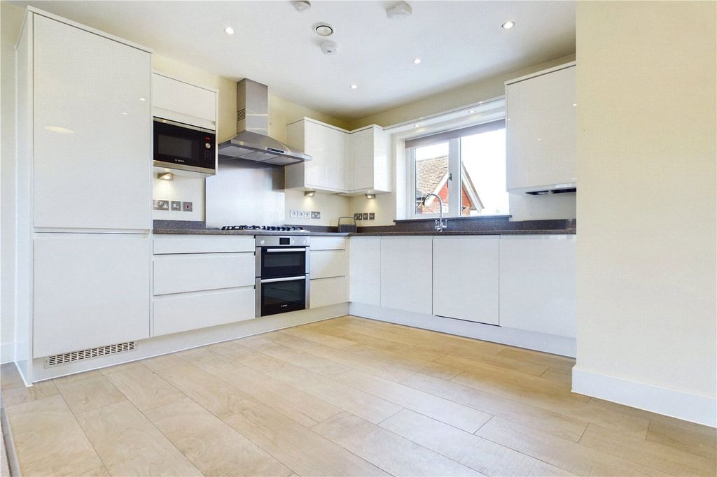 Property photo 2 of 13 Kitchen Area