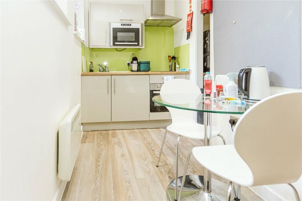 Property photo 2 of 8 A Bright And Tidy Modern Kitchen Featuring Light W...