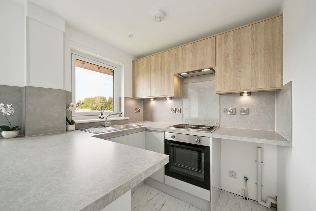 Property photo 2 of 12 Kitchen