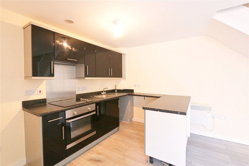 Property photo 3 of 10 Kitchen Area
