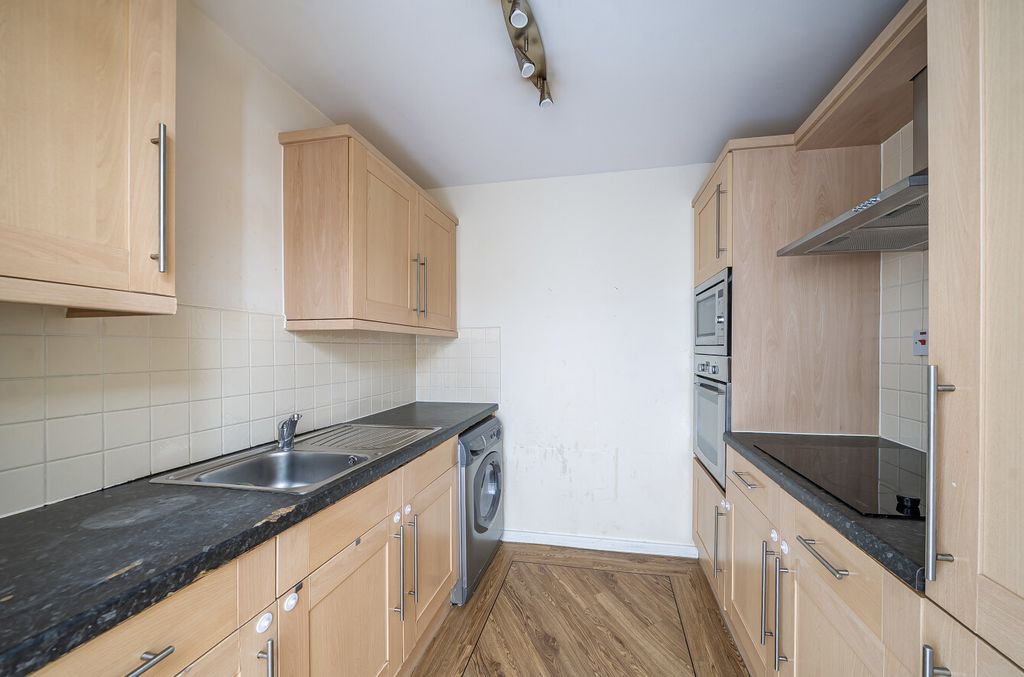 Property photo 2 of 12 Kitchen