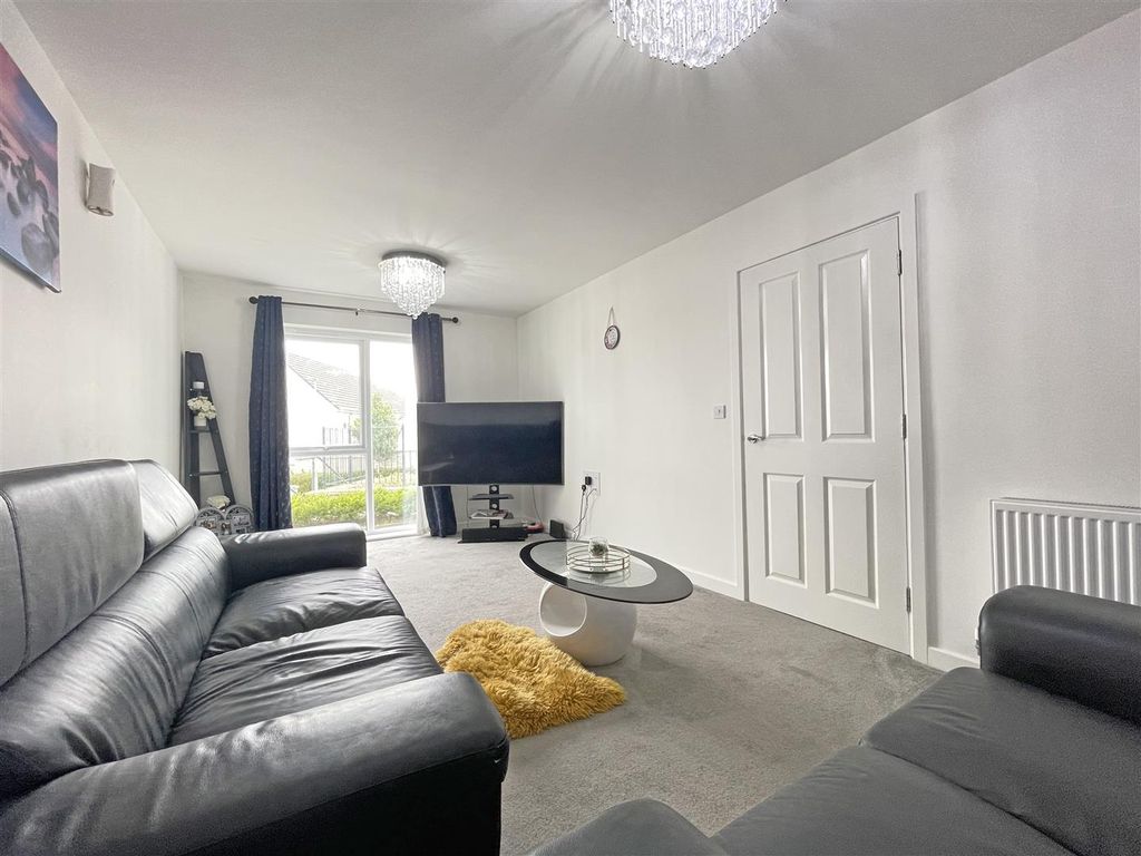 Property photo 2 of 13 Draco Drive 4 - Living Room.Jpg