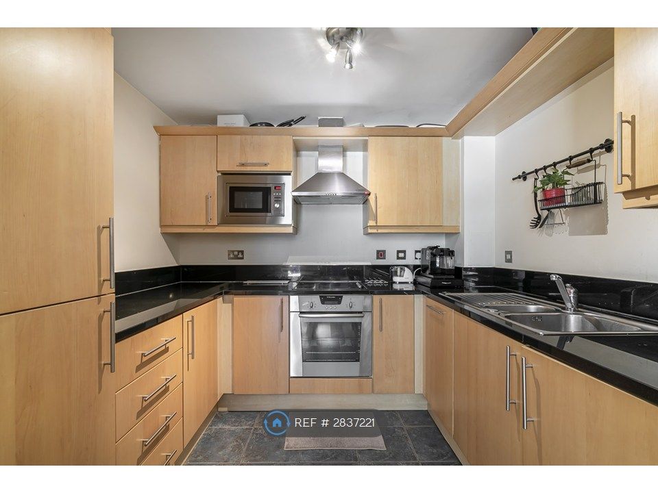 Property photo 2 of 12 Kitchen