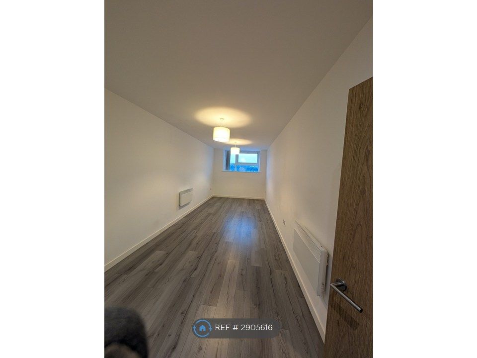 Property photo 3 of 10 Living Area 2/2