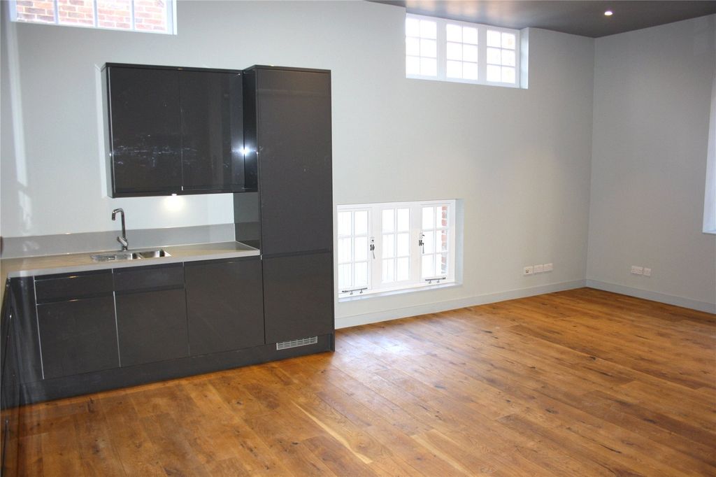 Property photo 3 of 9 Kitchen/Living Area