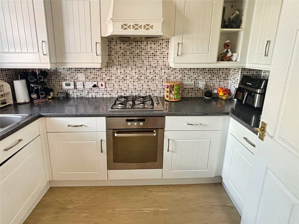 Property photo 2 of 12 Kitchen