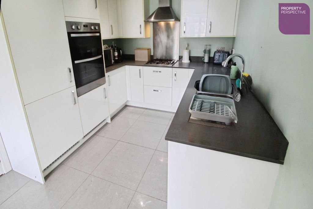 Property photo 3 of 13 Dining Kitchen