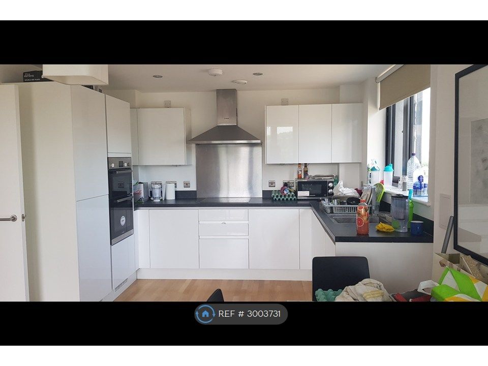 Property photo 1 of 12 Kitchen With Open Living Room