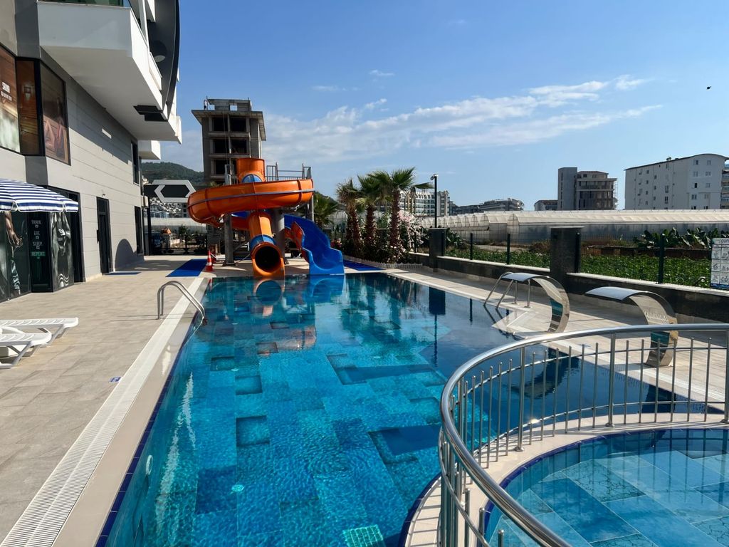 Property photo 2 of 24 Spacious 2-Bedroom Apartment For Sale In Alanya - Communal Swimming Pools And Sun Terraces