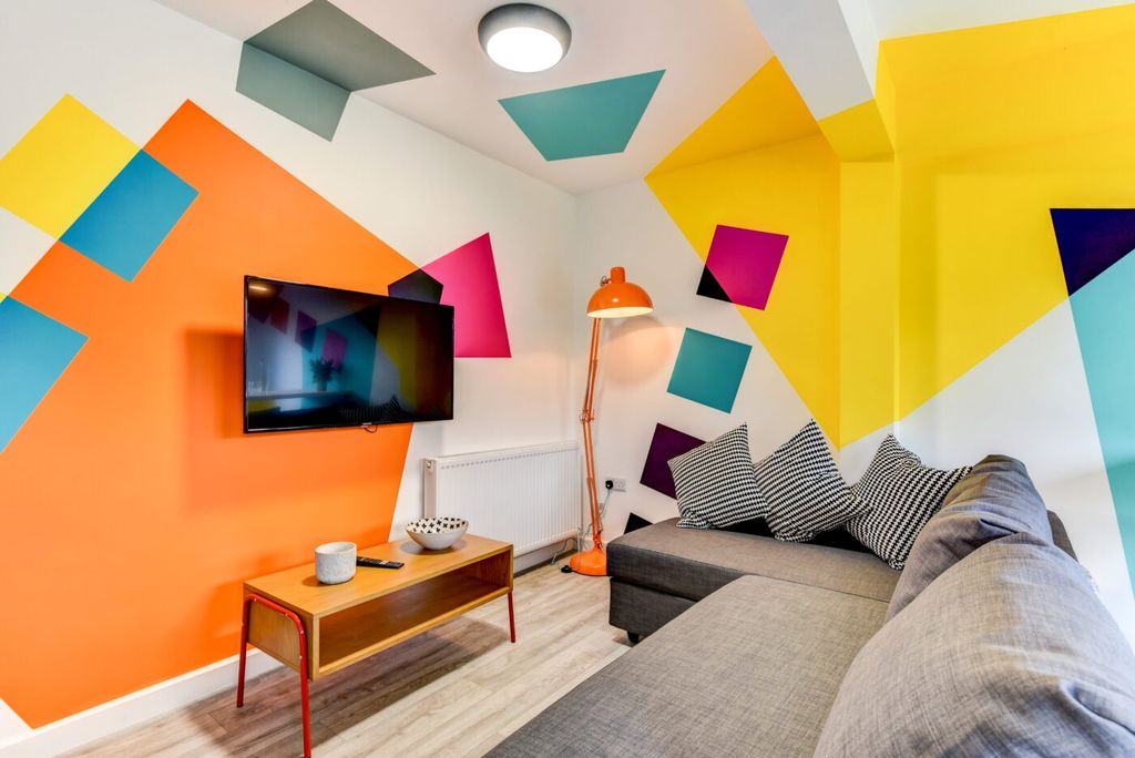 Property photo 3 of 5 Bright, Modern Living Room With A Colourful Geomet...