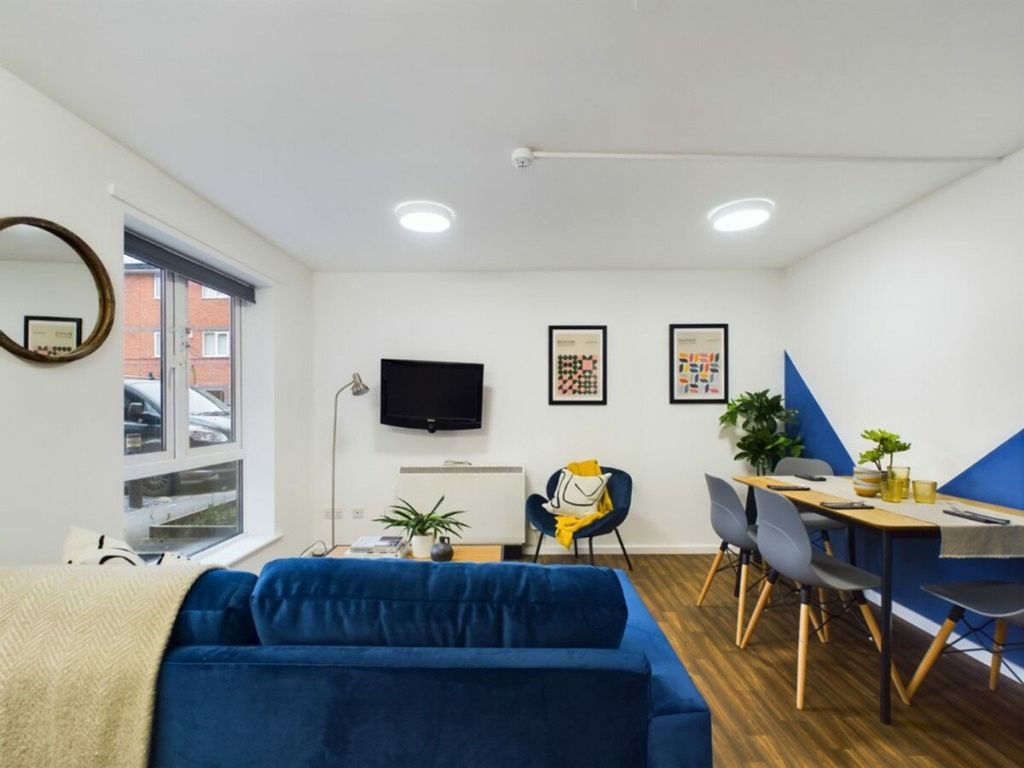 Property photo 2 of 15 A Spacious And Inviting Modern Living Room, Perfec...