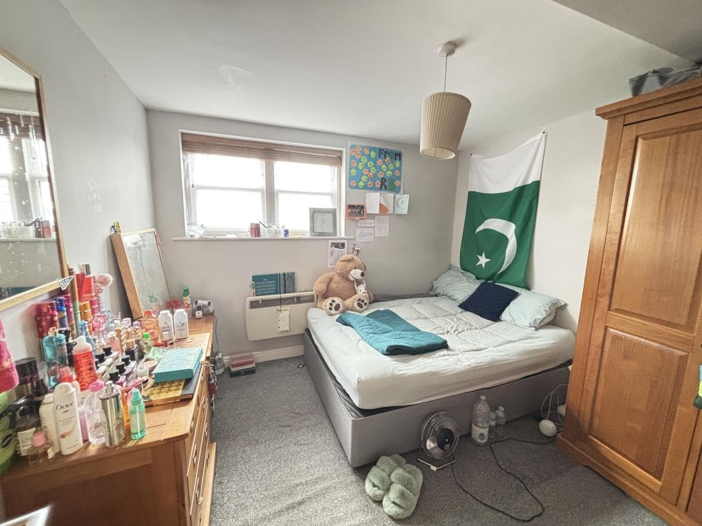 Property photo 1 of 7 A Spacious And Inviting Master Bedroom Featuring A...