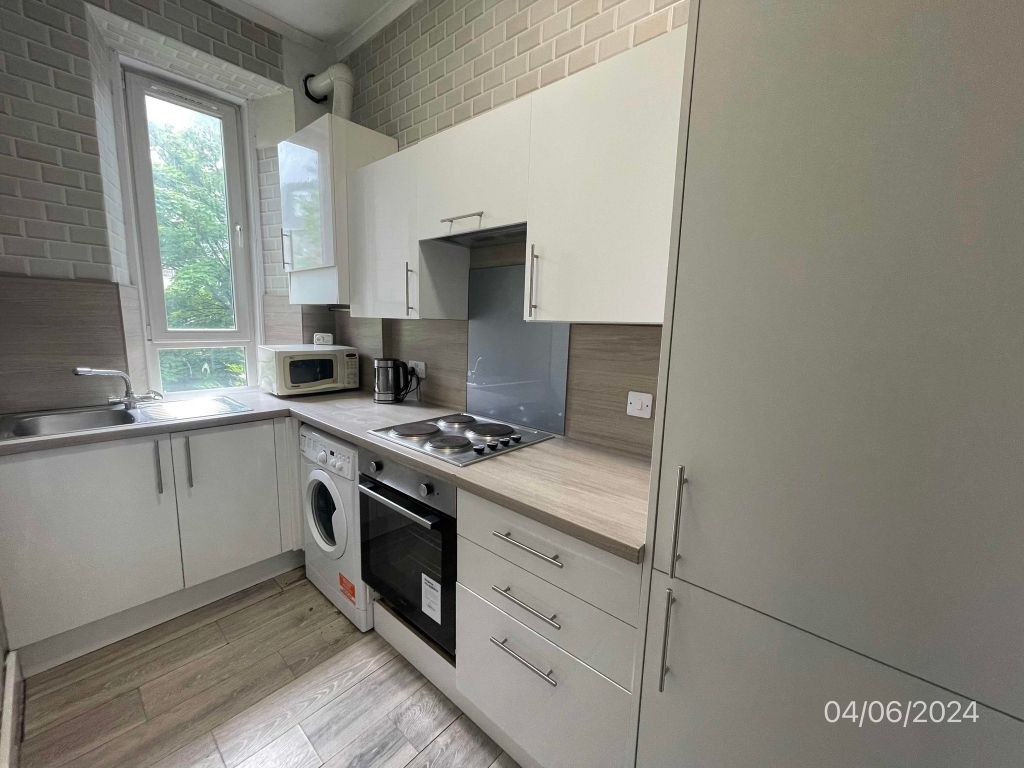 Property photo 2 of 9 Kitchen